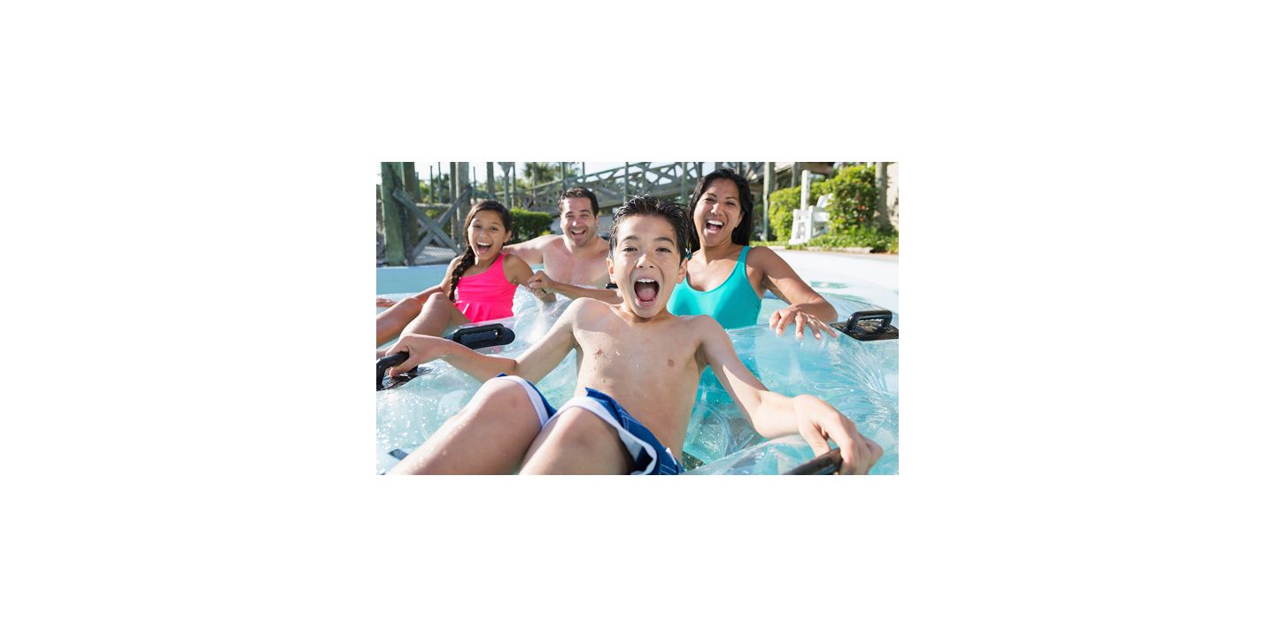 Couple laughing together white eating breakfast