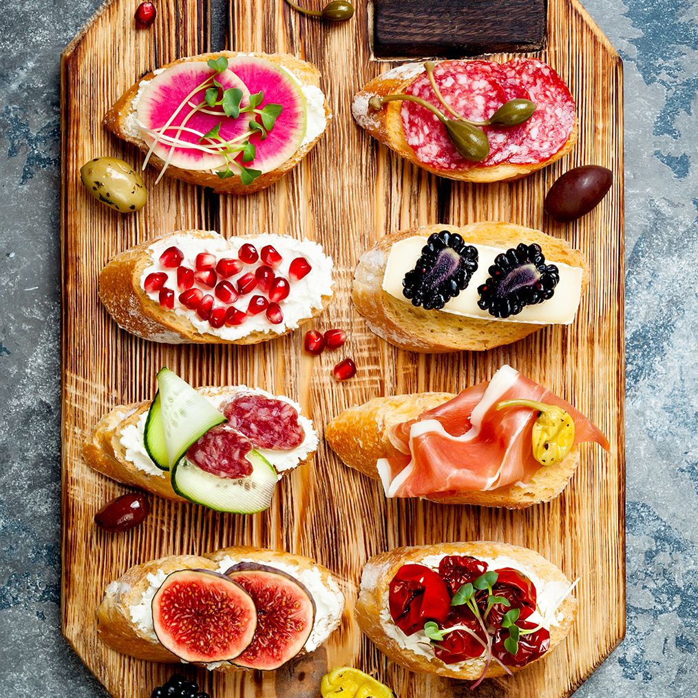 Festive Platter of Crostini with Many Gourmet Toppings