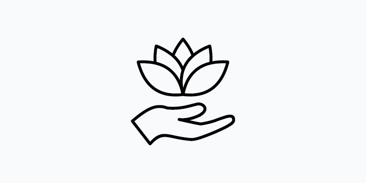 kimpton icon of a hand and lotus flower