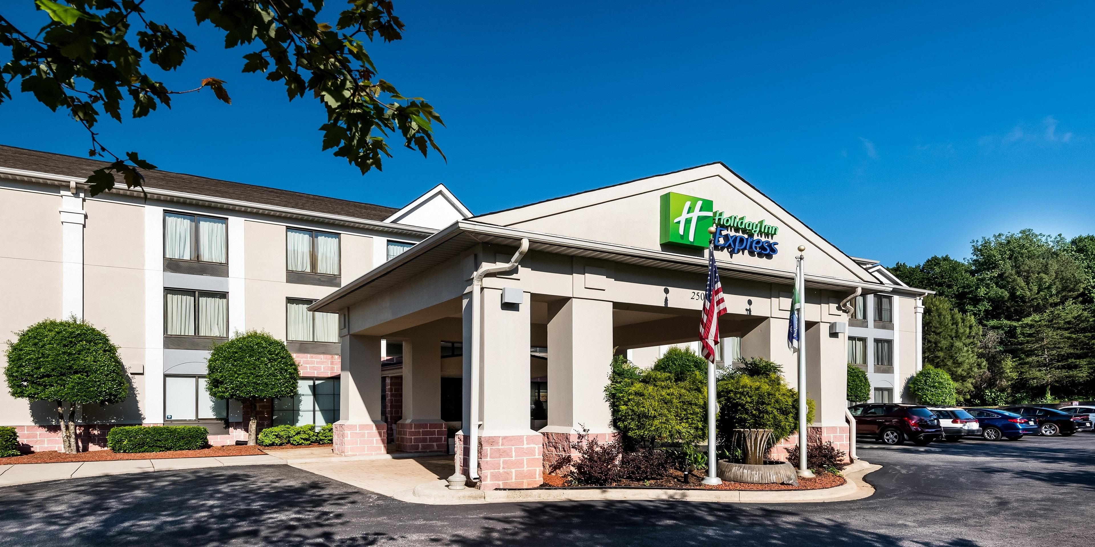 Holiday Inn Express Suites Charlotte Arpt Belmont Hotel In