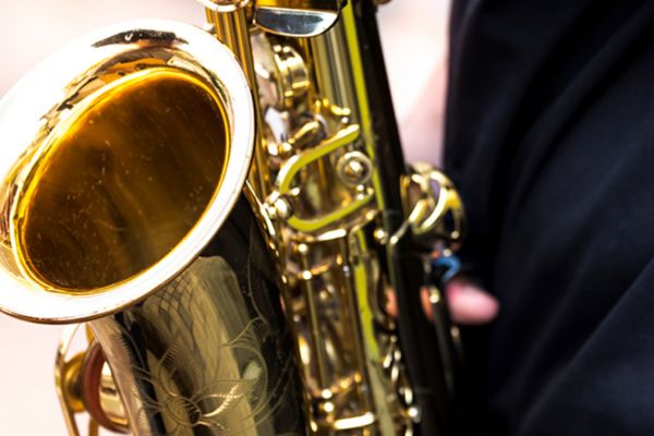Person playing saxaphone