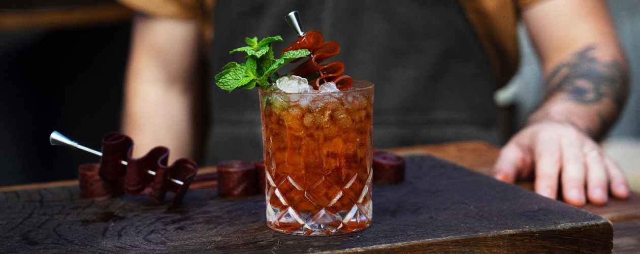 fruit leather garnish on a cocktail