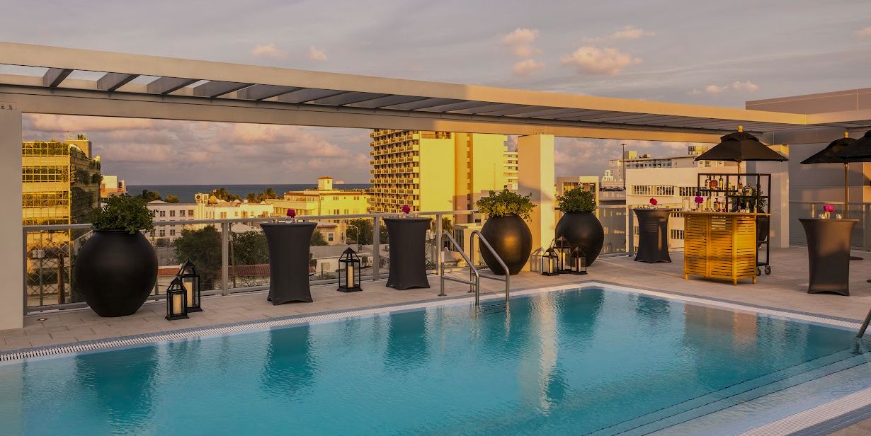 rooftop pool deck overlooking Miami at sunset