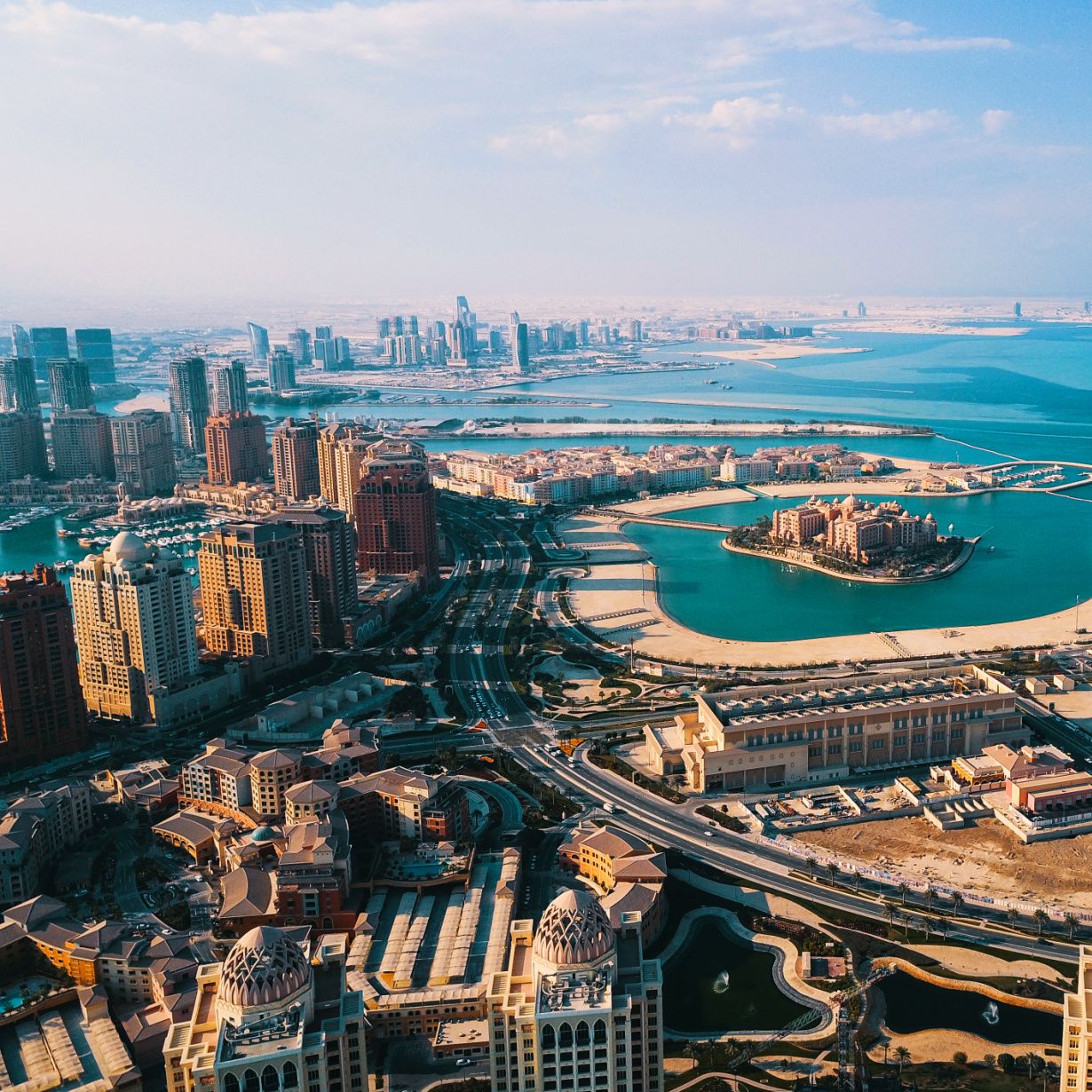 doha skyline with aerial coastal view of vast city