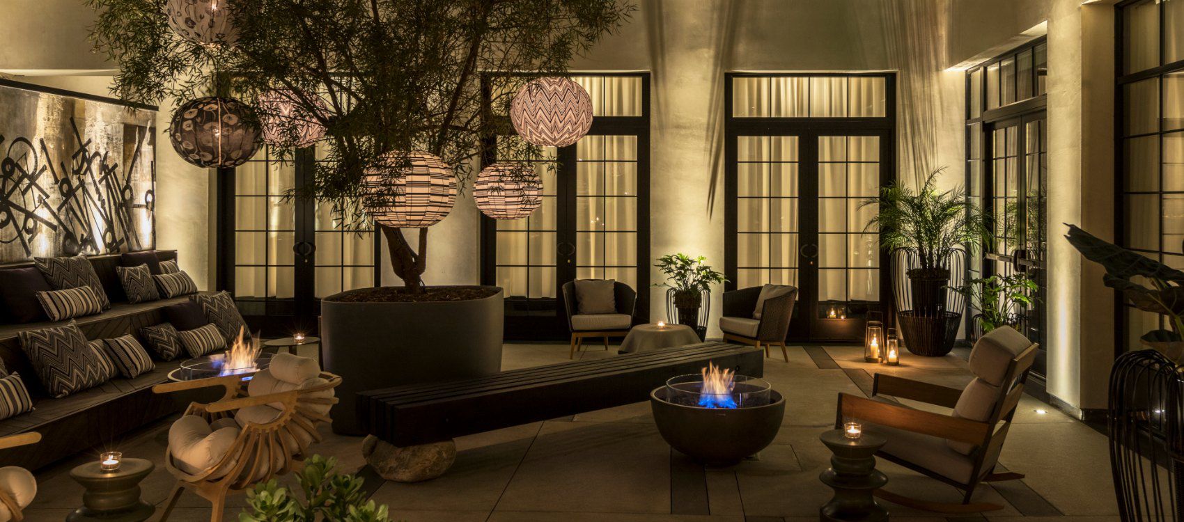 Upscale hotel lobby with fire pit