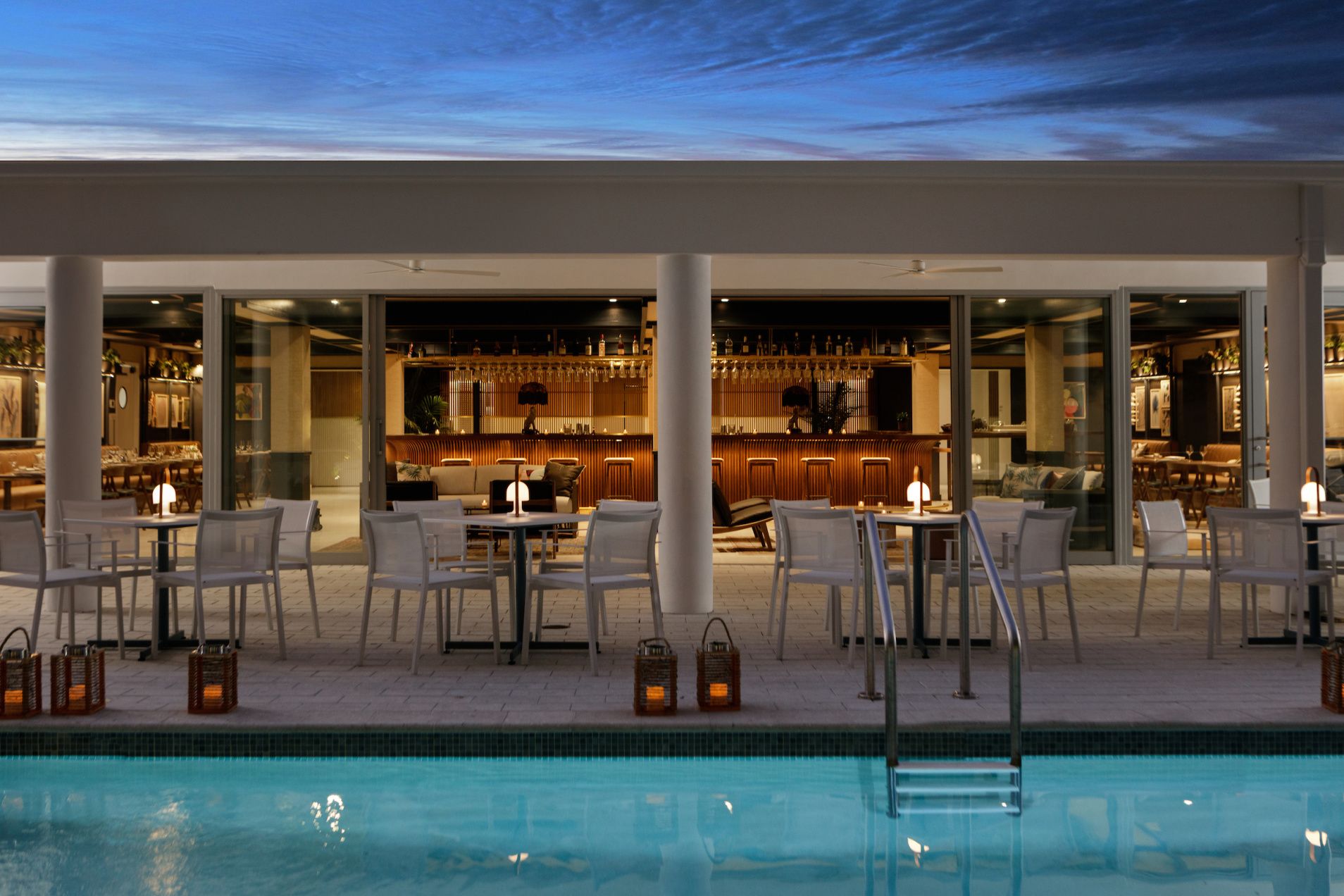 welcoming poolside bar and lounge at dusk in fort lauderdale beach
