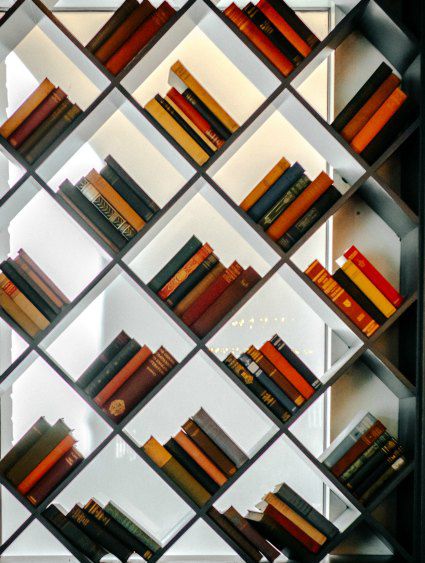 restaurant wall with angled with books