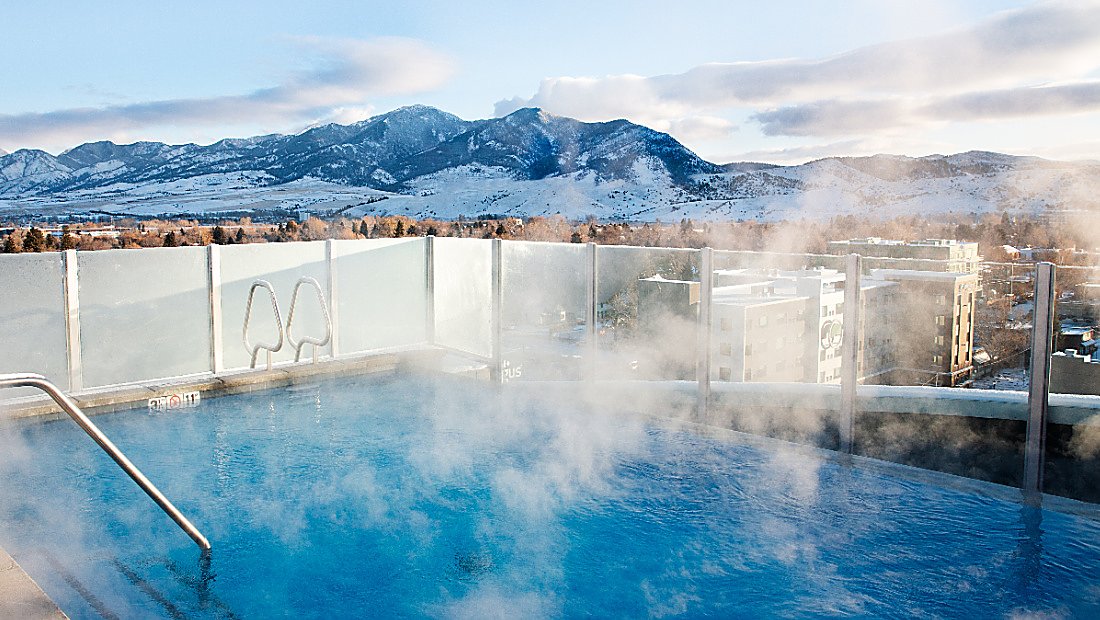 rooftop with steaming hot tub and views of Bozeman's mountains