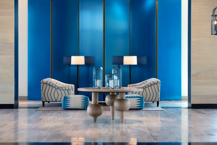 a fancy hotel lobby with blue decor