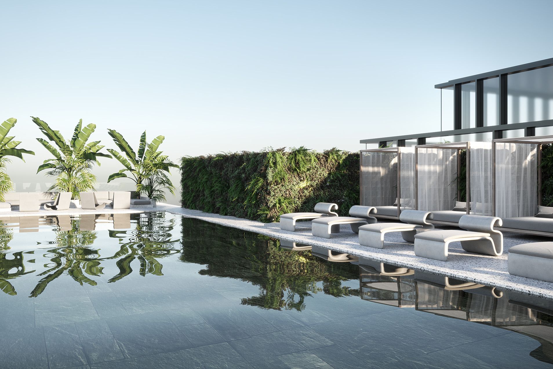 rooftop pool with sophisticated sitting areas and palm trees