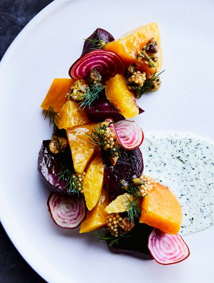 artistic plating of a colorful beet salad