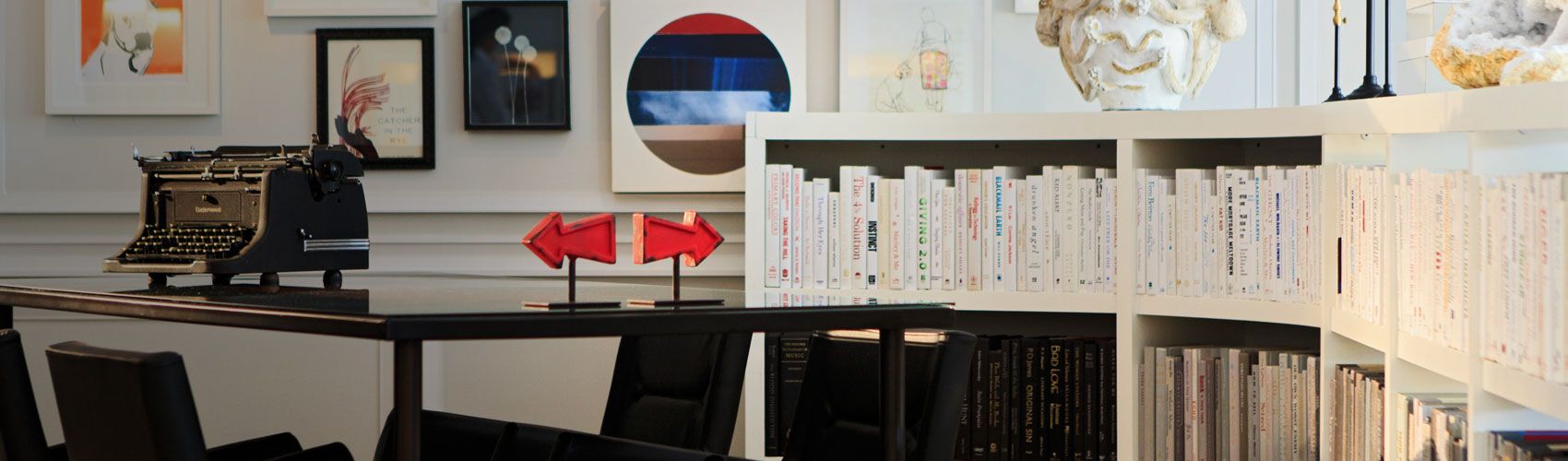 Woman sitting in chair reading a book